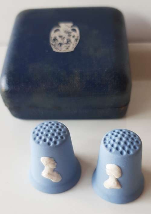 A collectors Set of Royal Wedding thimbles in blue jasperware by Wedgewood in original box