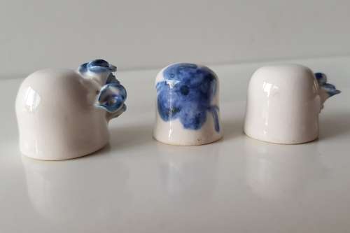 A Vintage set of 3x handmade thimble like cups. Set of three white ceramic Thimble