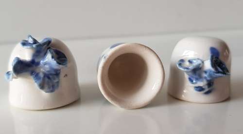 A Vintage set of 3x handmade thimble like cups. Set of three white ceramic Thimble