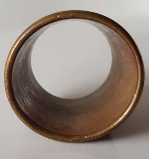 A Vintage collectors nickel-plated steel thimble. The Thimble is an open-ended tailors thimble
