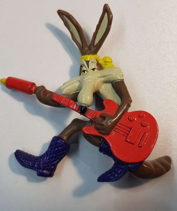 Vintage Warner Bros. Cartoon characters: Wile E Coyote playing guitar. PVC figure.