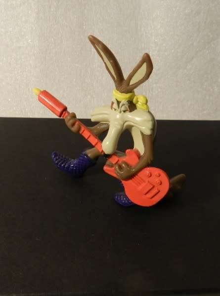 Vintage Warner Bros. Cartoon characters: Wile E Coyote playing guitar. PVC figure.
