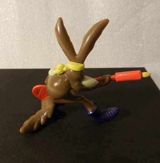 Vintage Warner Bros. Cartoon characters: Wile E Coyote playing guitar. PVC figure.