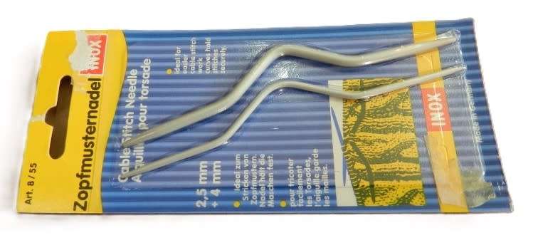 Vintage 2x Metal Cable stitch knitting needles still in packaging.