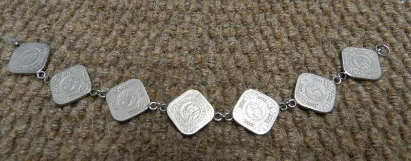 Coin Bracelet made with 7x quadrangular 5 cent pieces from the Netherlands. Made after Second World