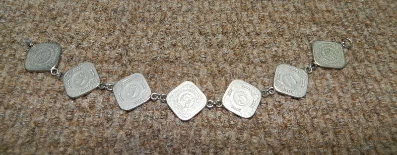 Coin Bracelet made with 7x quadrangular 5 cent pieces from the Netherlands. Made after Second World