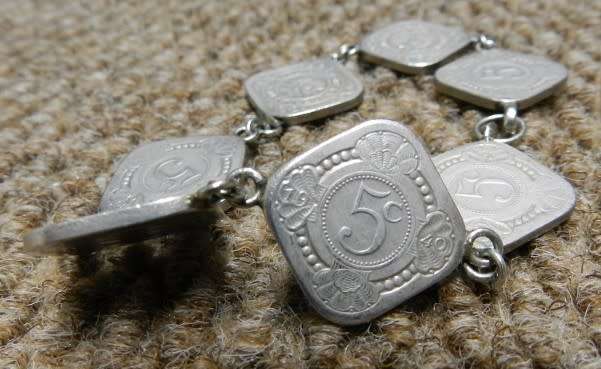 Coin Bracelet made with 7x quadrangular 5 cent pieces from the Netherlands. Made after Second World