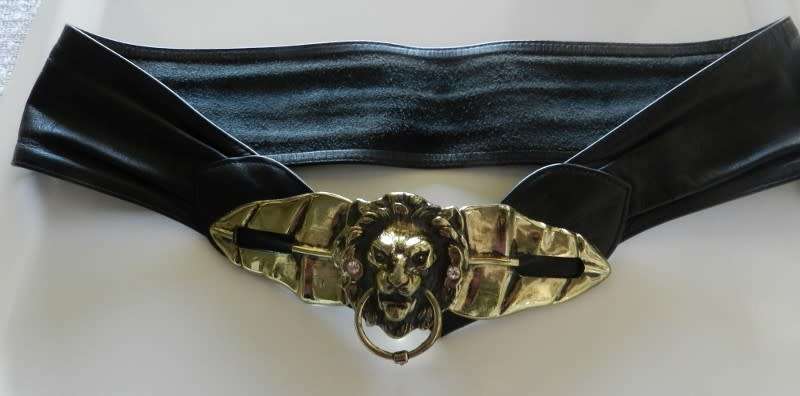 Ladies Funky belt. Black Leather belt with large lions head buckle.