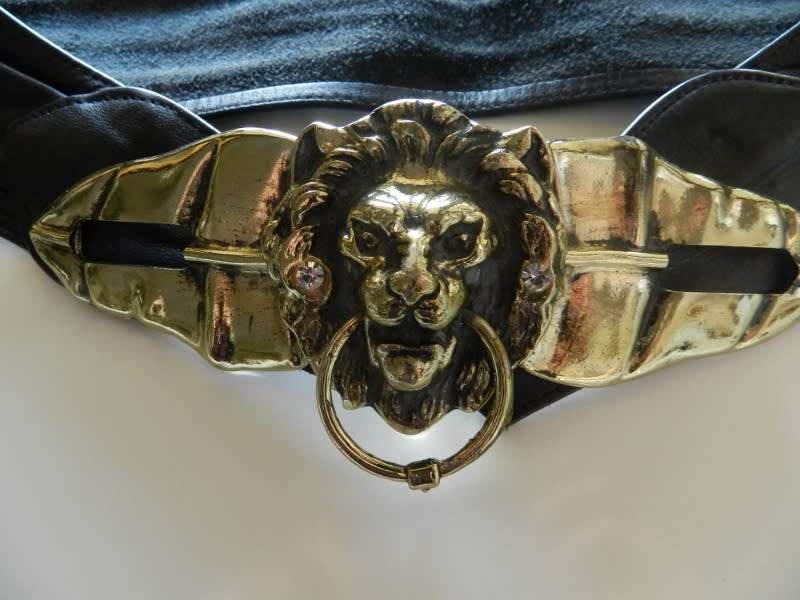 Ladies Funky belt. Black Leather belt with large lions head buckle.