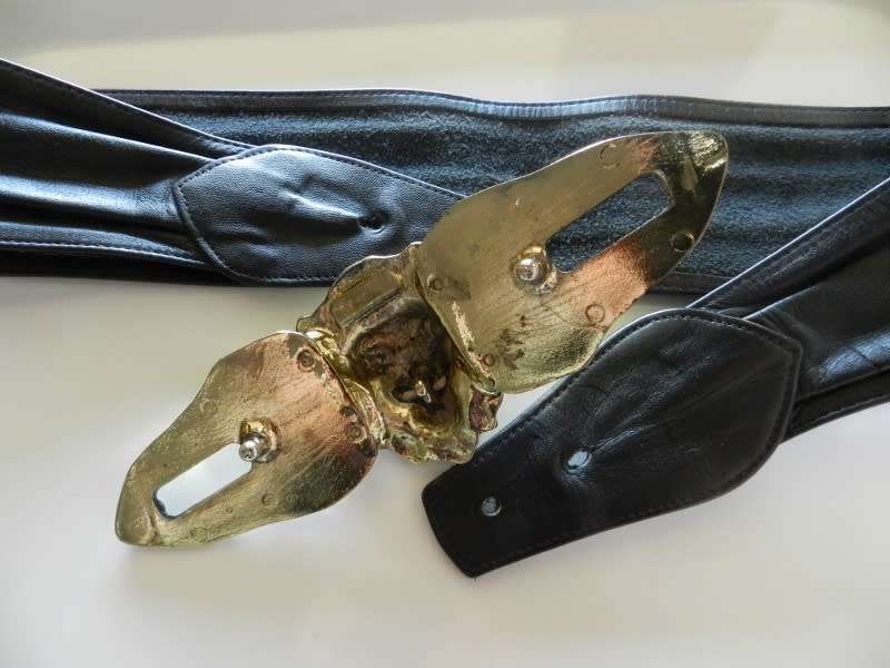 Ladies Funky belt. Black Leather belt with large lions head buckle.