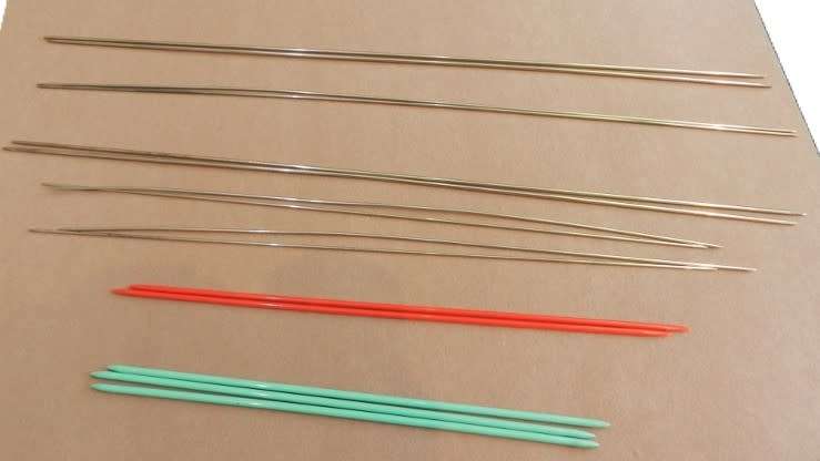 Vintage collection of knitting needles. Pointed on both ends.