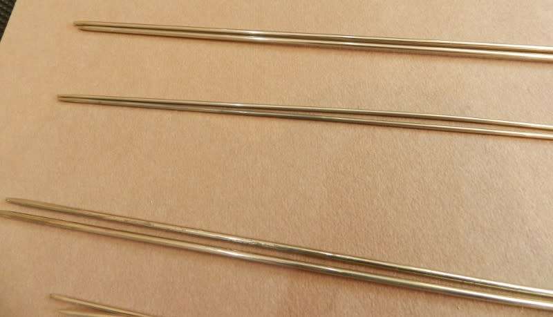 Vintage collection of knitting needles. Pointed on both ends.