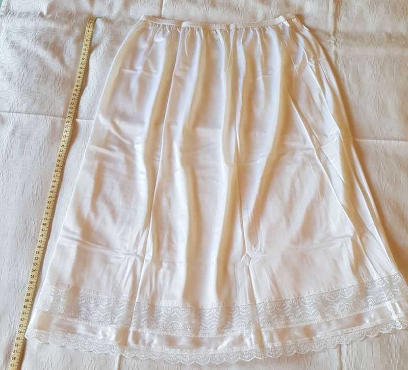 Petticoat Half Slip - White with wide laced edge. Length: 67cm Waist: 32cm (unstretched). As new.