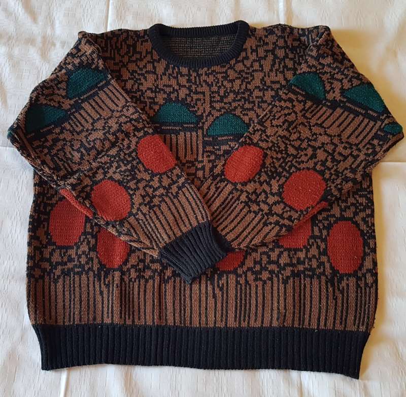 Ladies Black patterned Jersey  Pattern with burnt red/brown and green design.