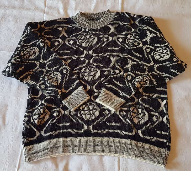 Ladies Black/White patterned Jersey  Black background with white design. Round neck, machine knitte