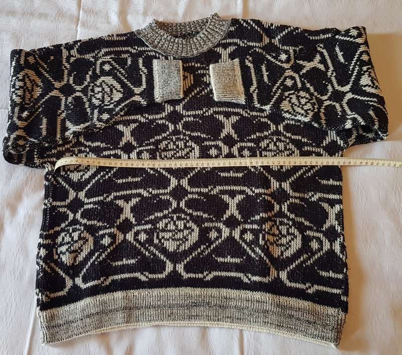 Ladies Black/White patterned Jersey  Black background with white design. Round neck, machine knitte
