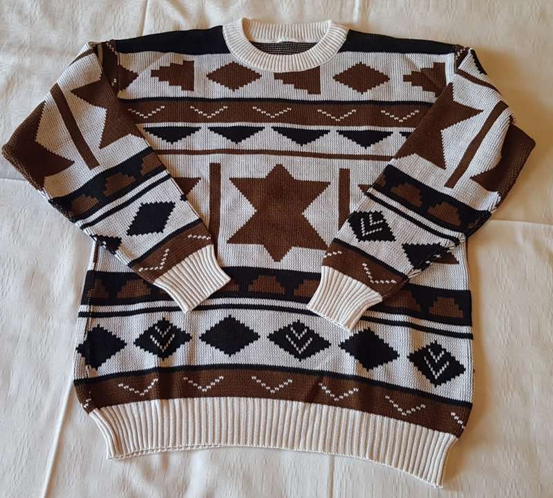 Ladies White/Black/Brown patterned Jersey  White background with black and brown designs.