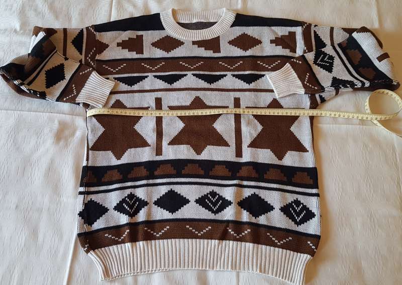 Ladies White/Black/Brown patterned Jersey  White background with black and brown designs.