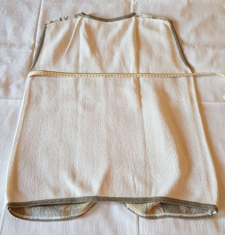 Ladies Sleeveless Cardigan  Cream background with beige/yellow and green pattern and four loop type