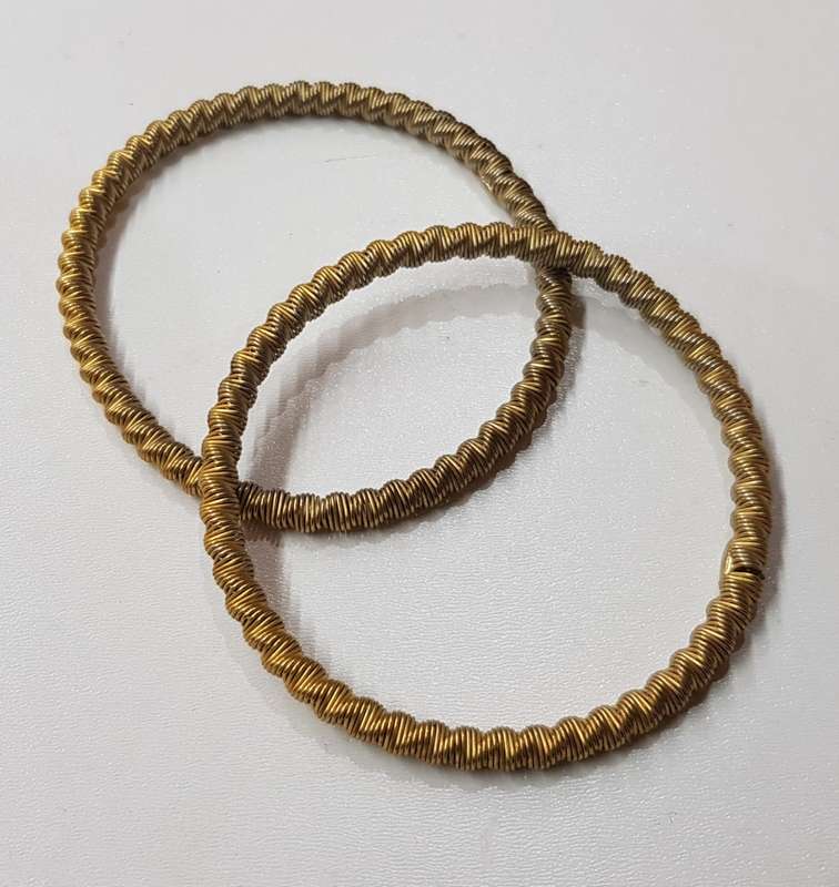 Vintage pair of metal Shirt Sleeve Garters for long sleeves.