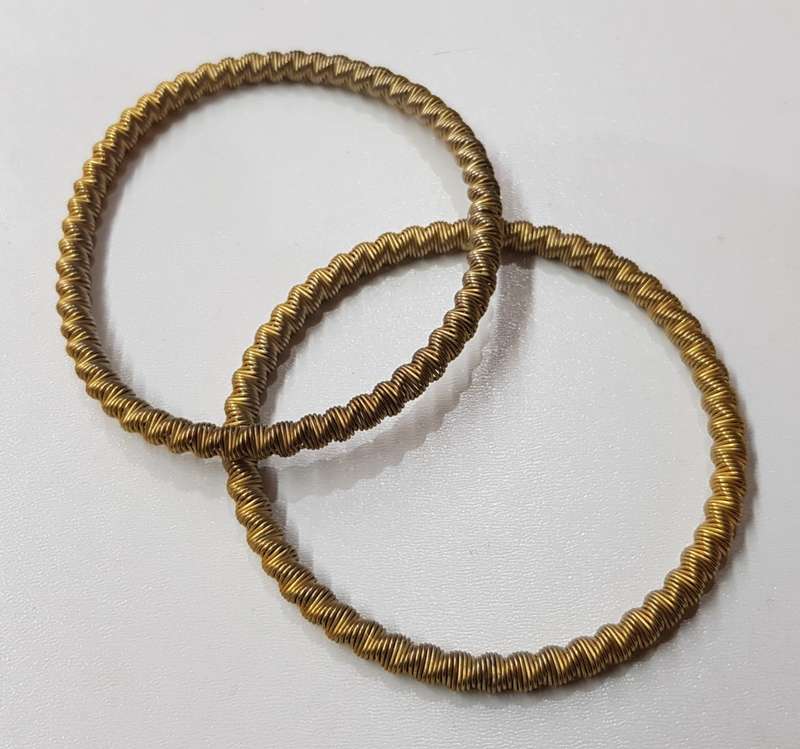 Vintage pair of metal Shirt Sleeve Garters for long sleeves.