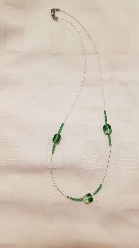 Vintage Costume Jewellery:  Wire necklace strung with green glass and African beads.
