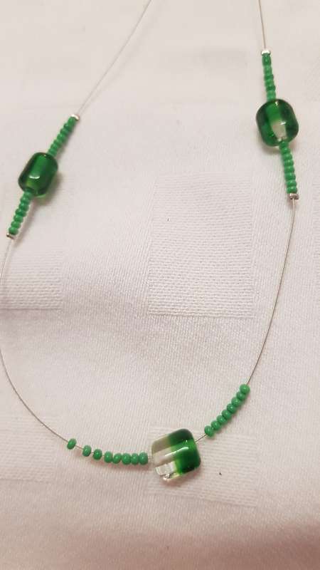 Vintage Costume Jewellery:  Wire necklace strung with green glass and African beads.