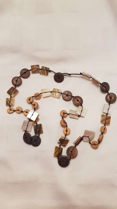 Costume Jewellery:  Necklace strung with brown and beige discs and bone squares on string.