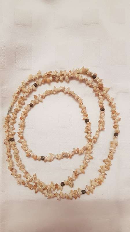 Vintage Costume Jewellery: Long Necklace strung with miniature shells and small wooden beads.