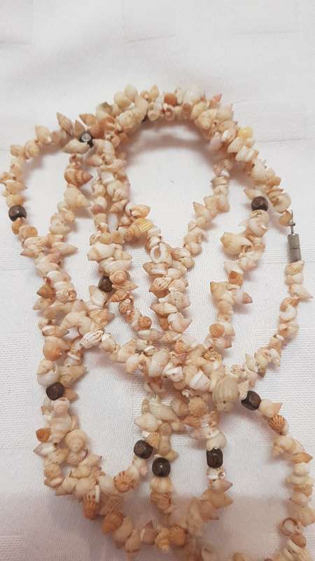Vintage Costume Jewellery: Long Necklace strung with miniature shells and small wooden beads.