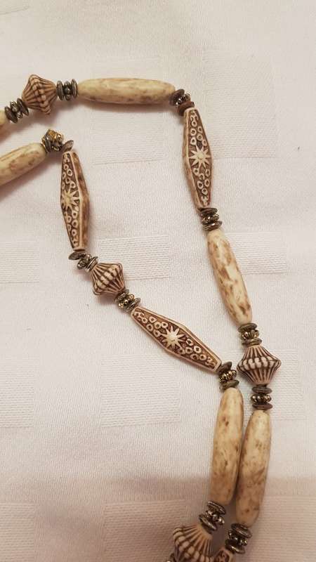 Vintage Costume Jewellery: Long Necklace strung with large ethnic type plastic beads.