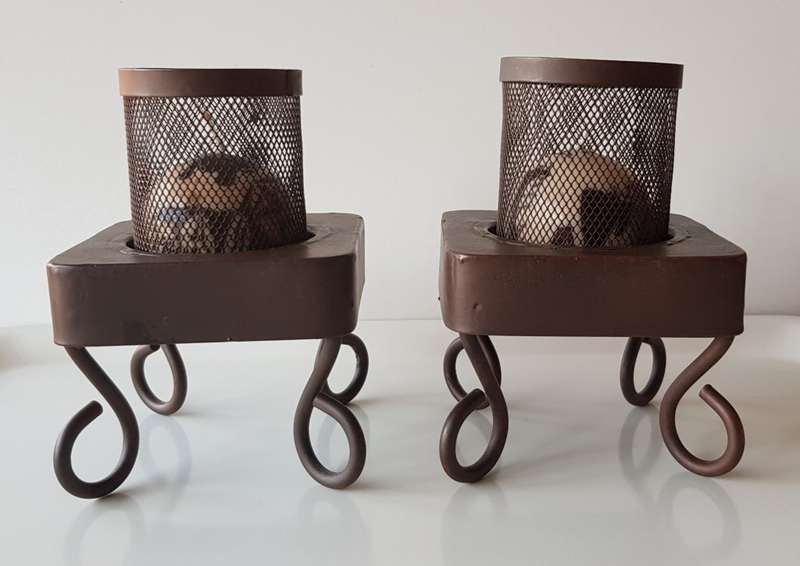 Set of 2x Metal Candle Holders/Stands. Metal painted brown with 2x small ball candles