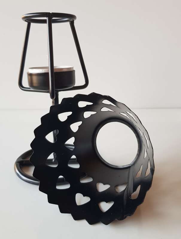 Black Metal Tea Light Burner Stand with a Hearts design metal shade.
