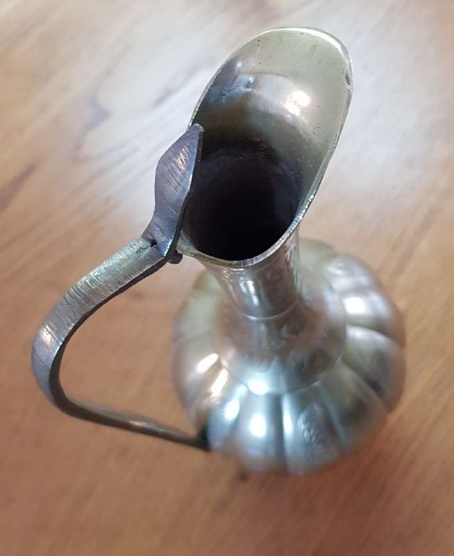 Brass Ornaments: Vintage Indian Brass Jug with long slender handle.