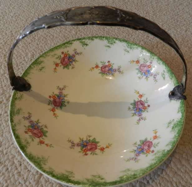 Antique Biscuit/Bon Bon Dish. Hand painted in Holland.  Porcelain floral design, silver handle