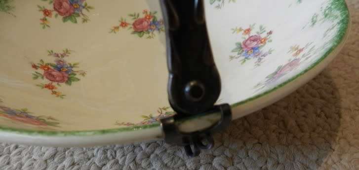 Antique Biscuit/Bon Bon Dish. Hand painted in Holland.  Porcelain floral design, silver handle