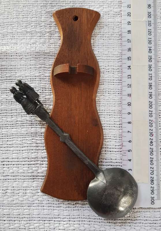 Antique Dutch Pewter wedding spoon.  18/19th Century on a wooden spoon rest.