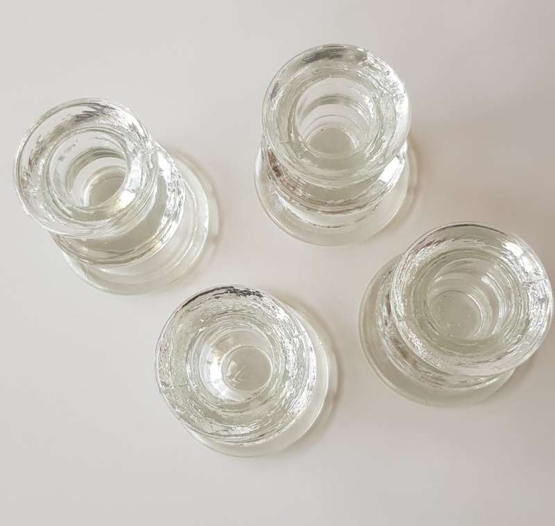Set of 4x Pedestal type Glass Candle Holders. Round base