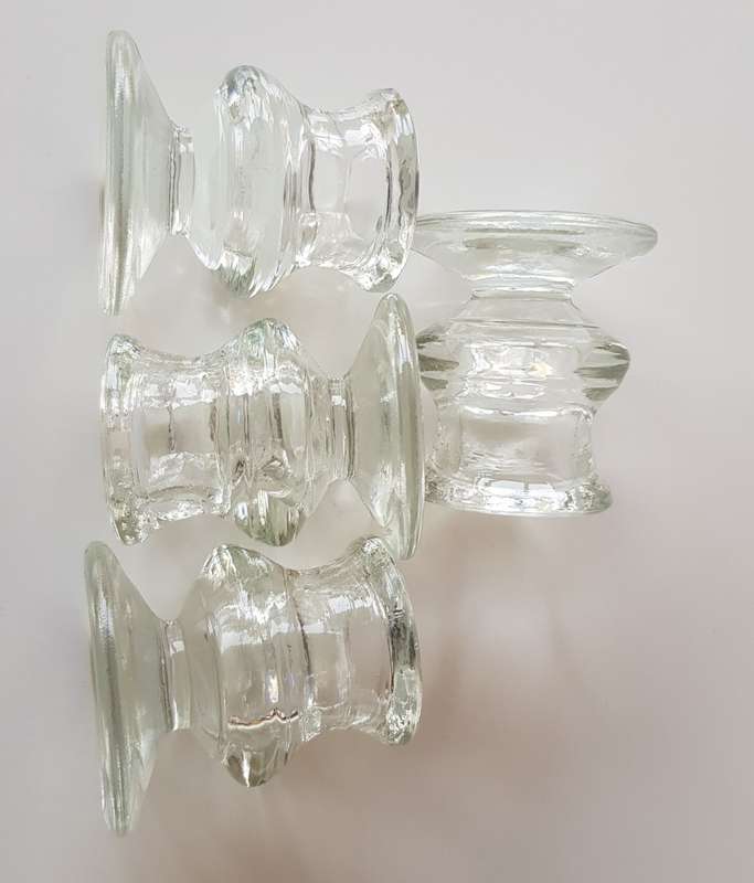 Set of 4x Pedestal type Glass Candle Holders. Round base