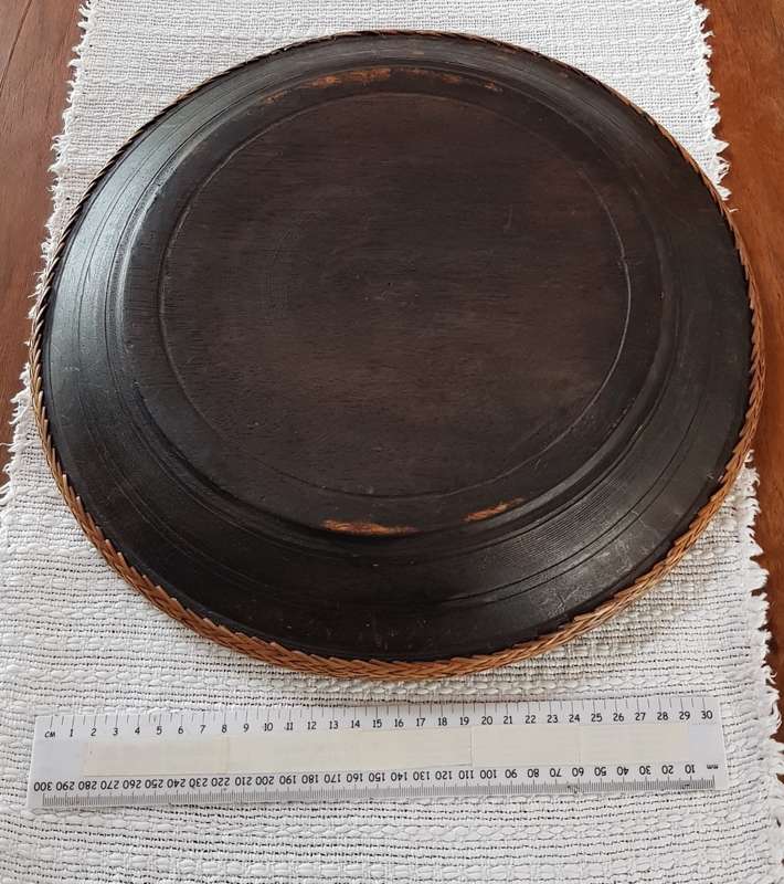 African Craft round wooden fruit bowl/platter with basket weave edge on rim.