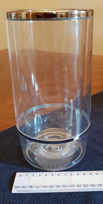 Clear Plastic Wine cooler, double sided (for insulation) with silver edging.