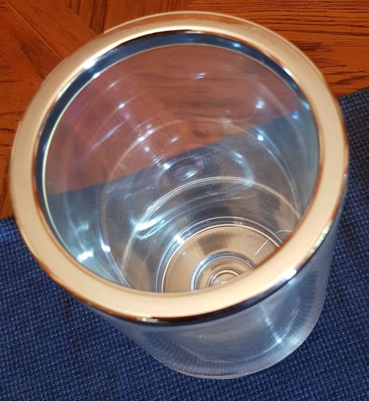 Clear Plastic Wine cooler, double sided (for insulation) with silver edging.
