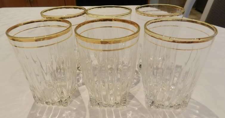 Vintage Heavy Bottom Type pressed glass drinking glasses with hand painted Gold Rim.  Circa 1960s.