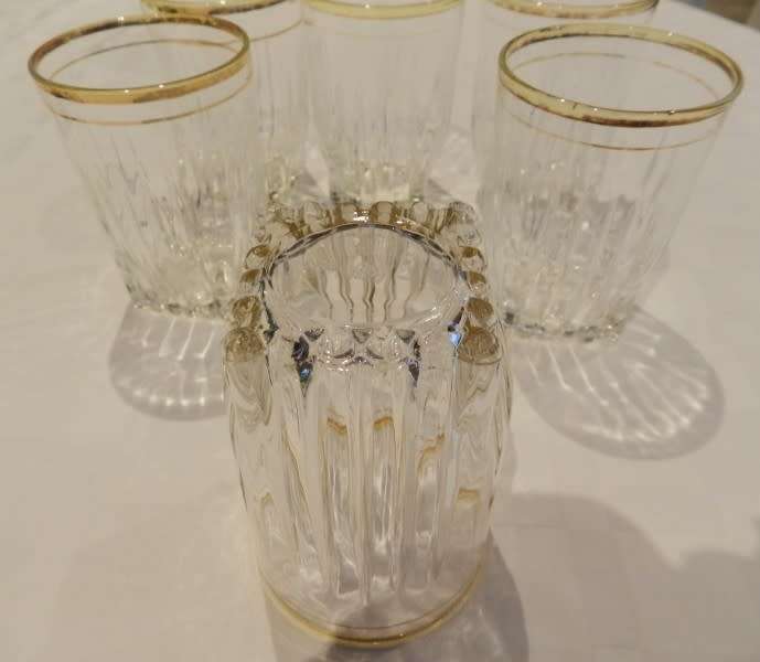 Vintage Heavy Bottom Type pressed glass drinking glasses with hand painted Gold Rim.  Circa 1960s.