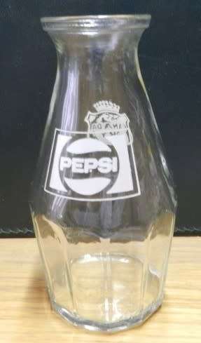 Vintage drinks mix carafe marked Pepsi one side and Canada Dry
