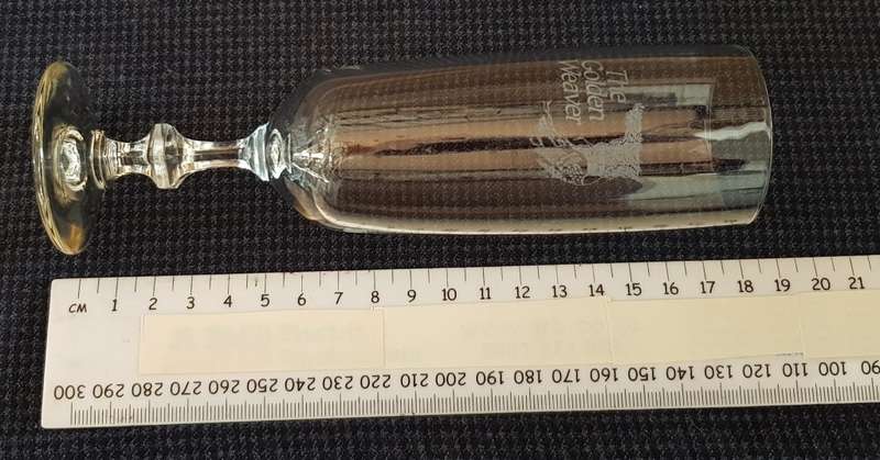 Glass: 1x Stemmed Champagne flute etched with name the Golden Weaver.