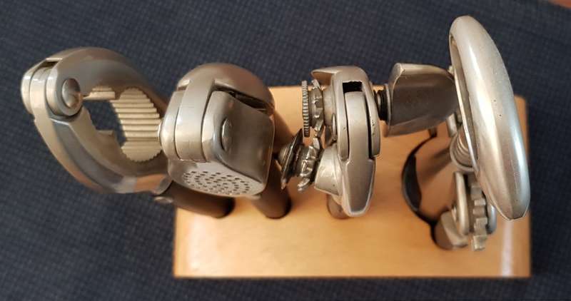 Bar/Kitchen opener set on wooden base.