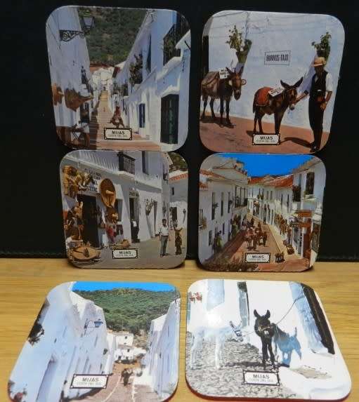 Vintage cork coasters, scenes of Mijas Costa del Sol in Spain.