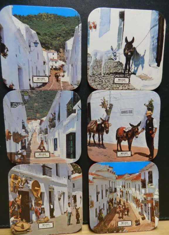 Vintage cork coasters, scenes of Mijas Costa del Sol in Spain.
