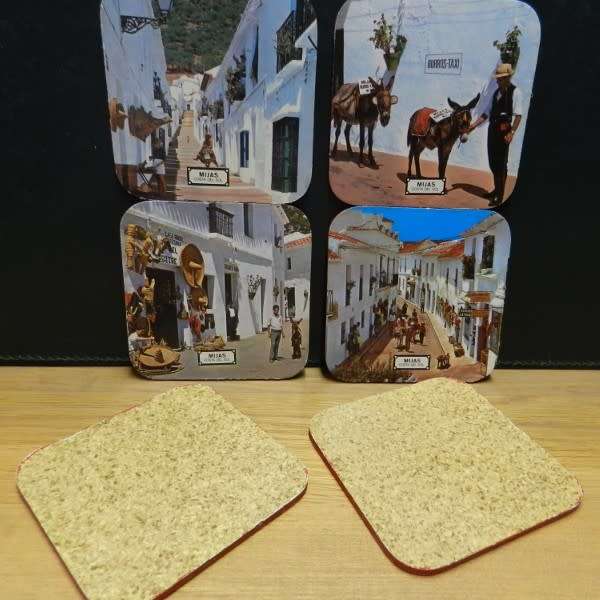 Vintage cork coasters, scenes of Mijas Costa del Sol in Spain.